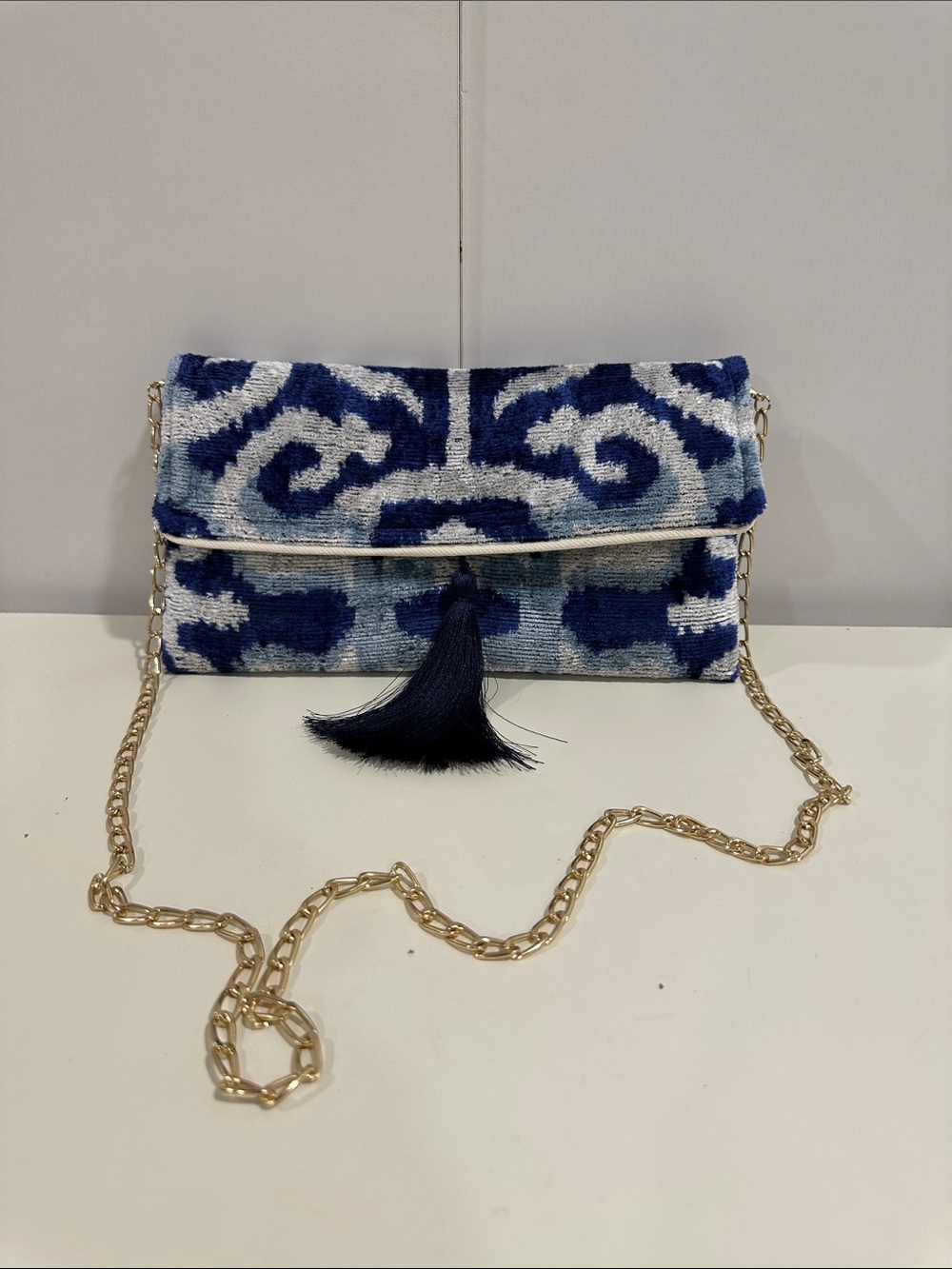 Elegant navy and white patterned clutch